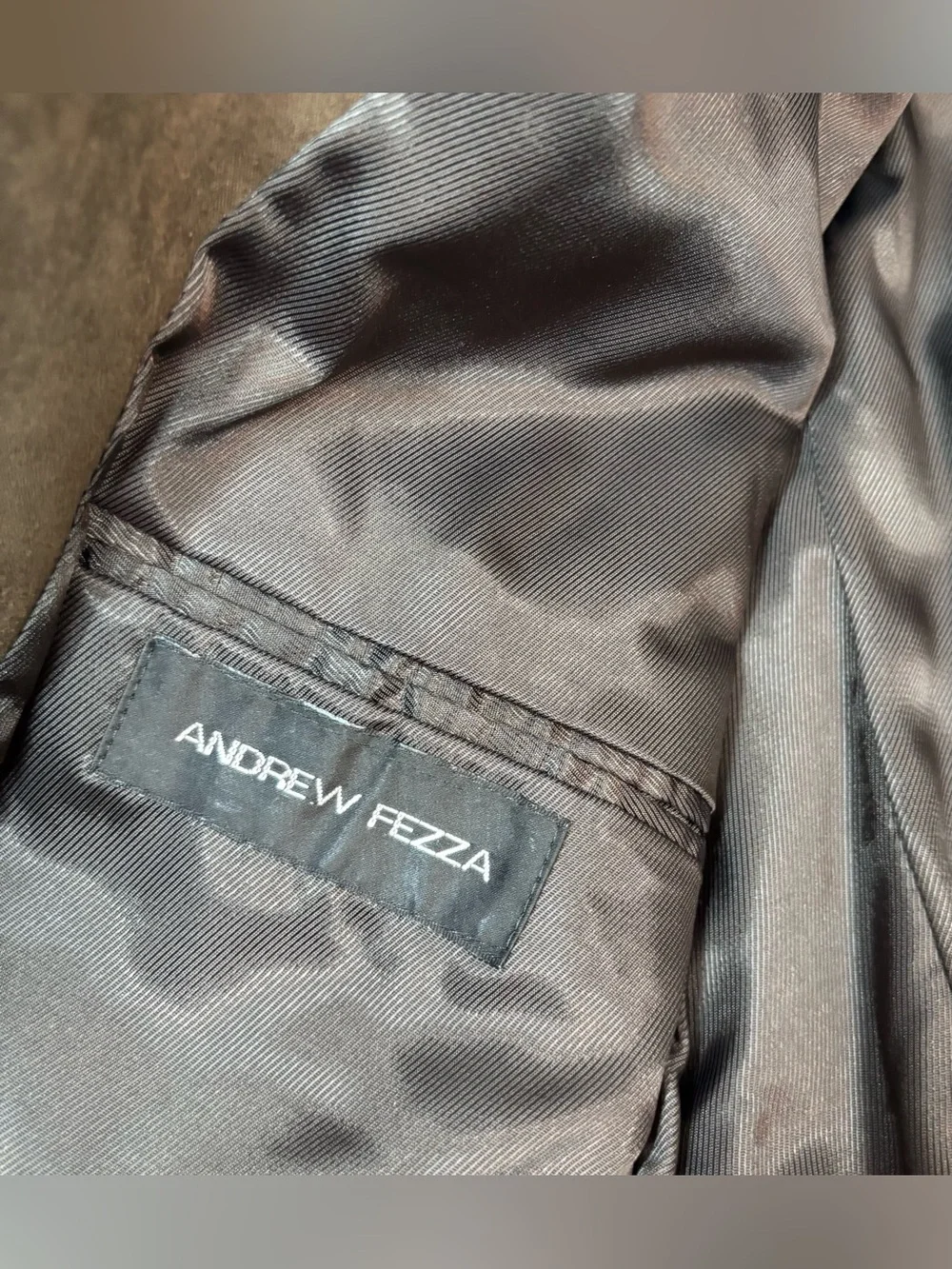 Andrew Fezza gently used